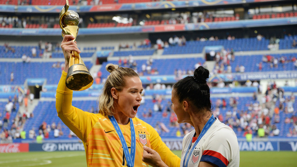Ashlyn Harris and Ali Krieger celebrate winning the Women's World Cup
